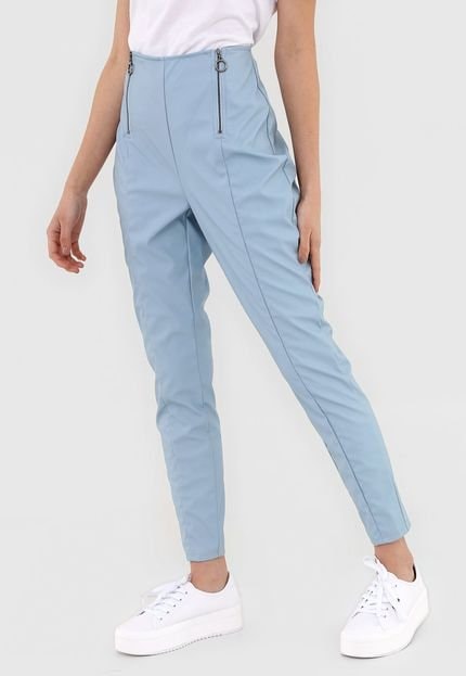 Calças efeito pele com fecho